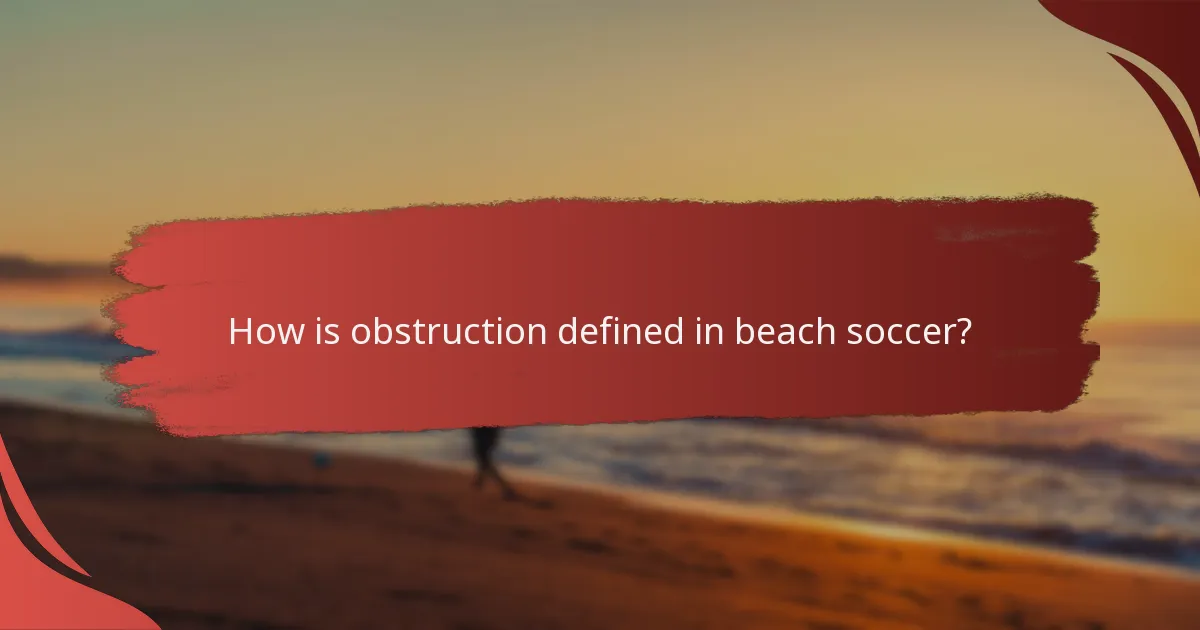 How is obstruction defined in beach soccer?